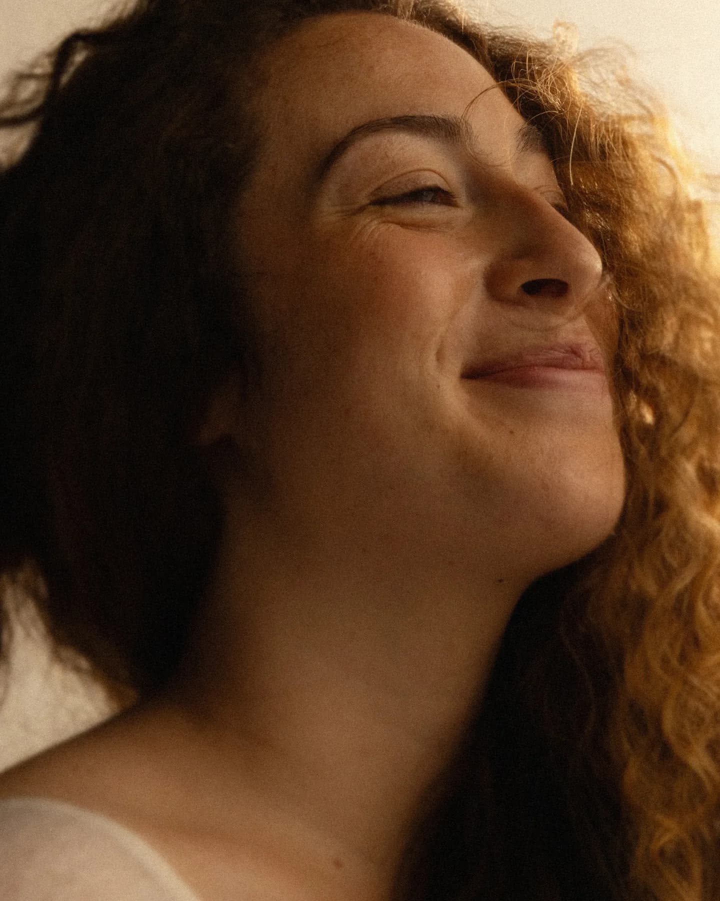blonde woman smiling and relaxed