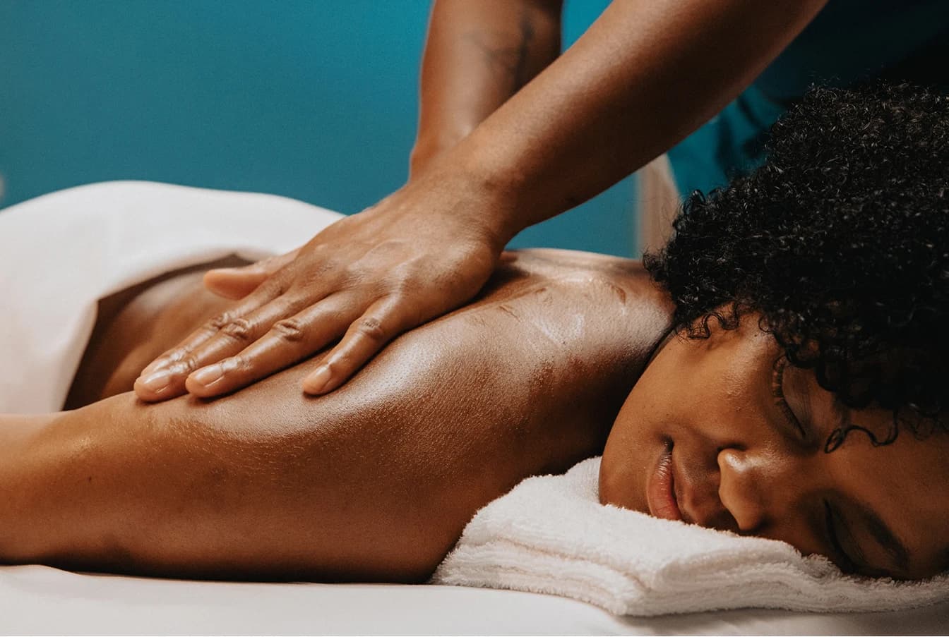 Person receiving a massage at Hand and Stone massage and facial spa
