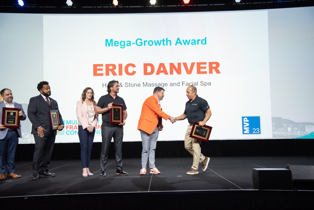 Eric Danver recieving franchise award.